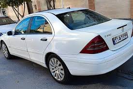 مزایده  بنز C240  رنگ : سفید  مدل : 2002