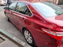 مزایده خودرو-مزایده فروش خودرو تویوتا کمری هیبرید XLE  رنگ : قرمز  مدل : 2015