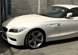 مزایده 3 دستگاه خودرو  و موتور سیکلت (گمرکی) شامل :سواری BMW Z4 و دیگر اقلام | ایران مزایده